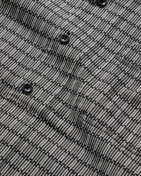 material shot of the buttons on The Short Sleeve Hawthorne in Navy Stripe, Wovens by Taylor Stitch