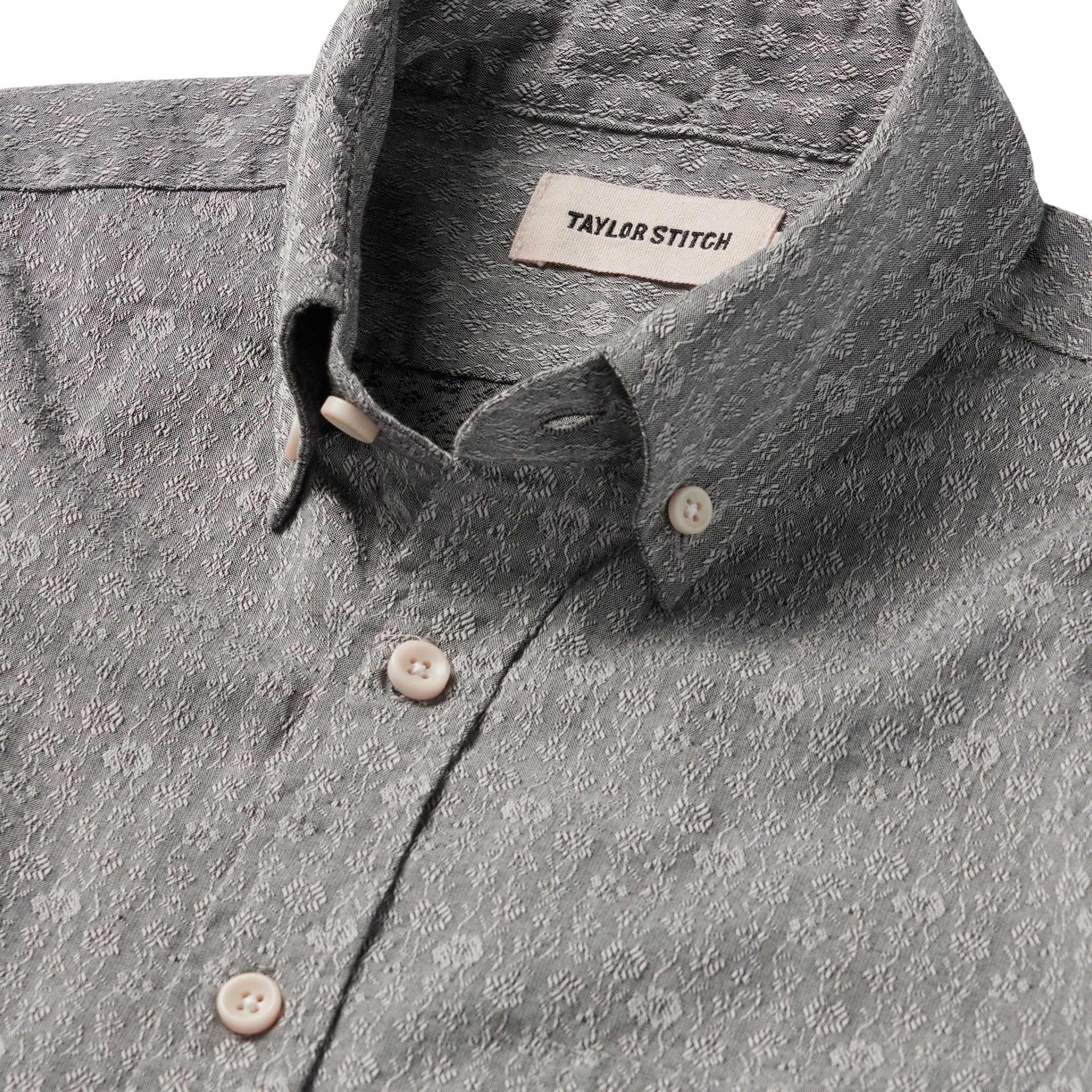 material shot of the collar and floral pattern on The Short Sleeve Jack in Ash Floral, Wovens by Taylor Stitch