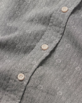 material shot of the buttons on The Short Sleeve Jack in Ash Floral, Wovens by Taylor Stitch