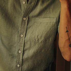 fit model showing close up of the pocket  of The Short Sleeve Jack in Sage and Natural