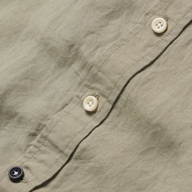 material shot of the buttons on The Short Sleeve Jack in Sage and Natural