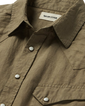 material shot of the collar and front yoke on The Short Sleeve Western in Olive Linen, Wovens by Taylor Stitch