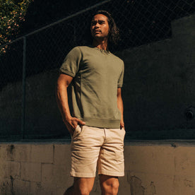 fit model standing in The Short Sleeve Fillmore Crew in Olive