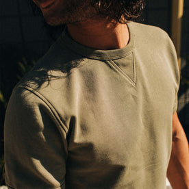 fit model showing the ribbing detail on The Short Sleeve Fillmore Crew in Olive
