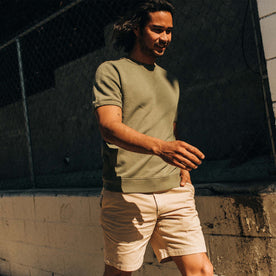 fit model walking in The Short Sleeve Fillmore Crew in Olive