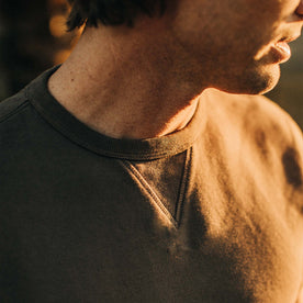 fit model showing the ribbed collar detail on The Short Sleeve Fillmore Crew in Walnut