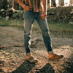 fit model walking in The Slim Jean in Patch Wash Selvage