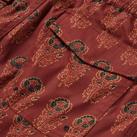 material shot of the back pocket of The Adventure Short in Rust Floral
