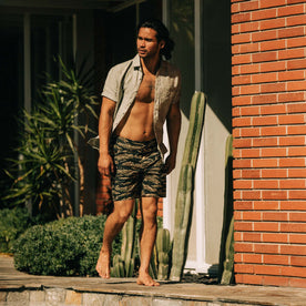 fit model wearing The Adventure Short in Tiger Camo
