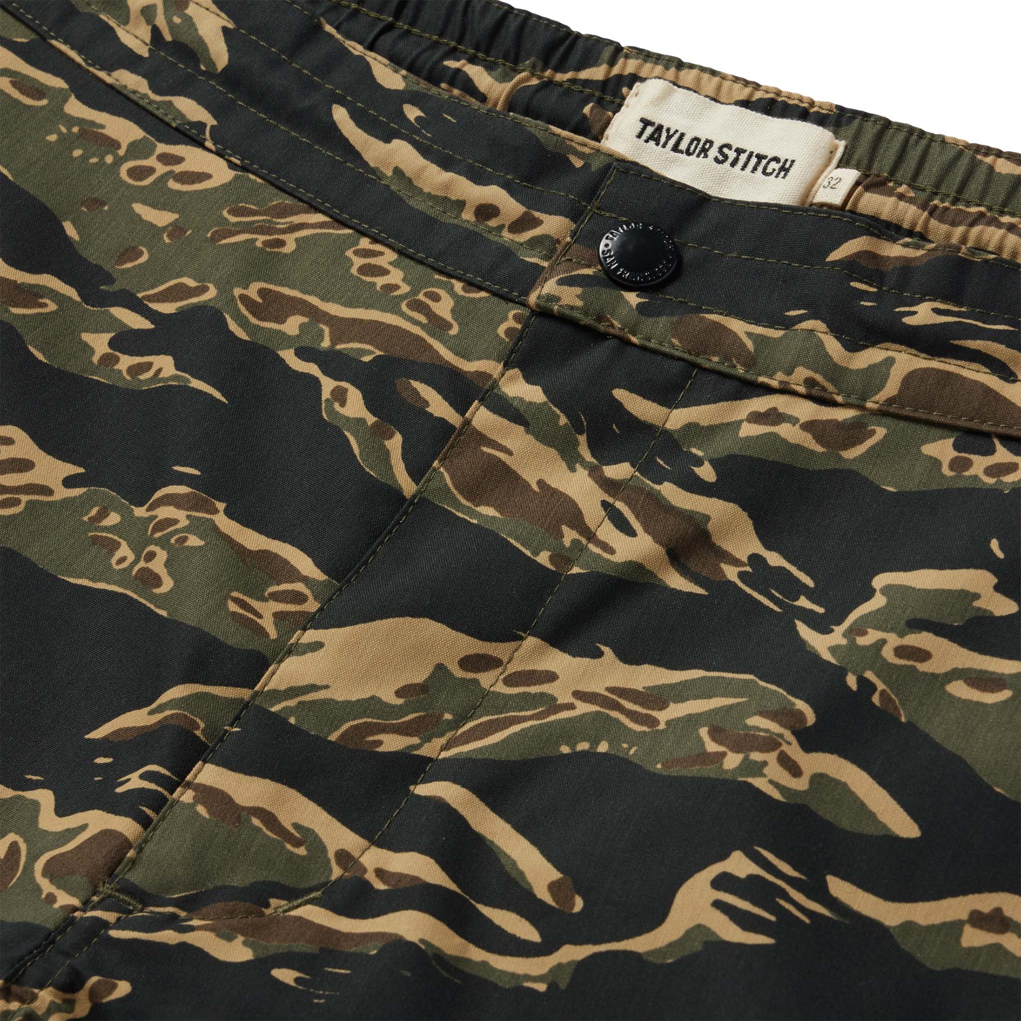 material shot of the button fly of The Adventure Short in Tiger Camo, Bottoms by Taylor Stitch