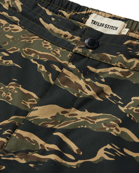 material shot of the button fly of The Adventure Short in Tiger Camo, Bottoms by Taylor Stitch