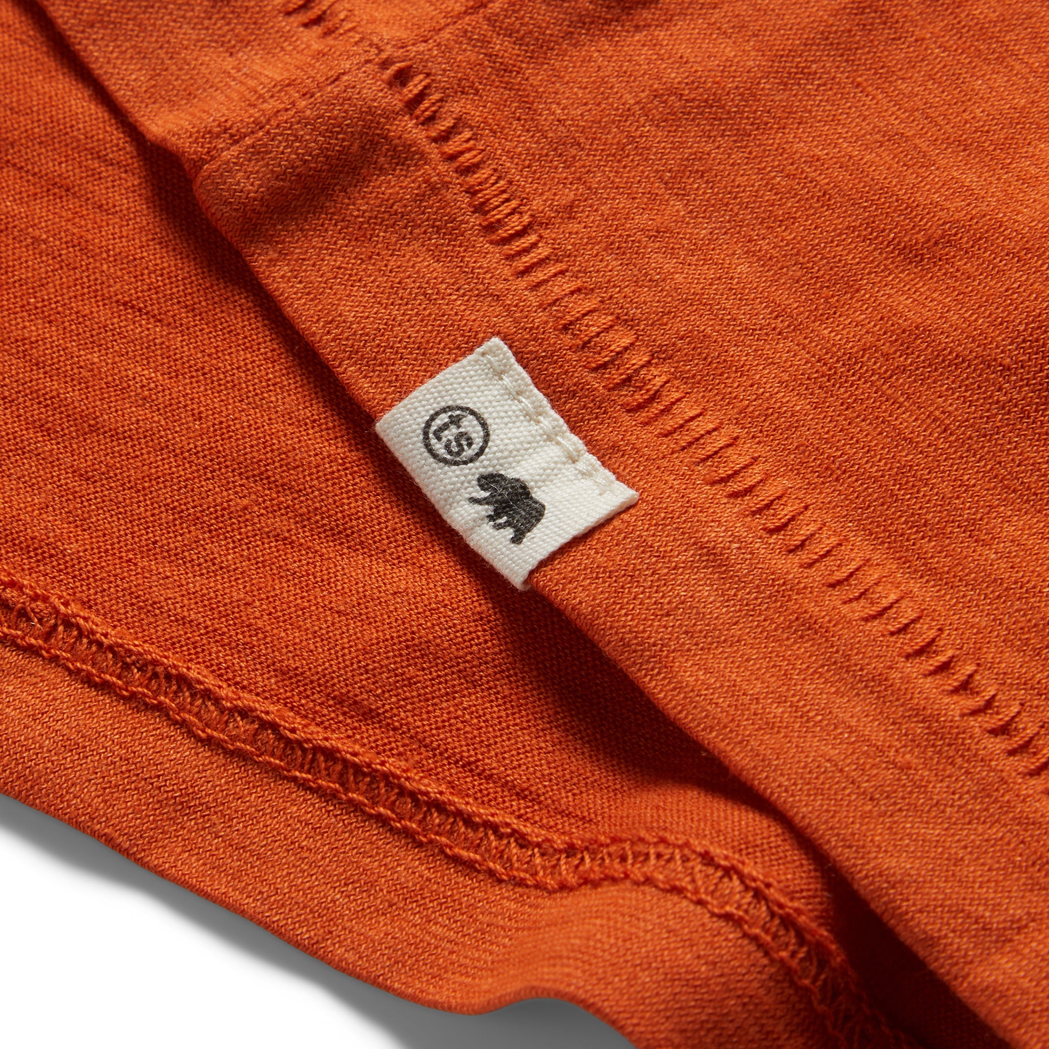 material shot of the TS label on The Cotton Hemp Tee in Monarch, Knits by Taylor Stitch