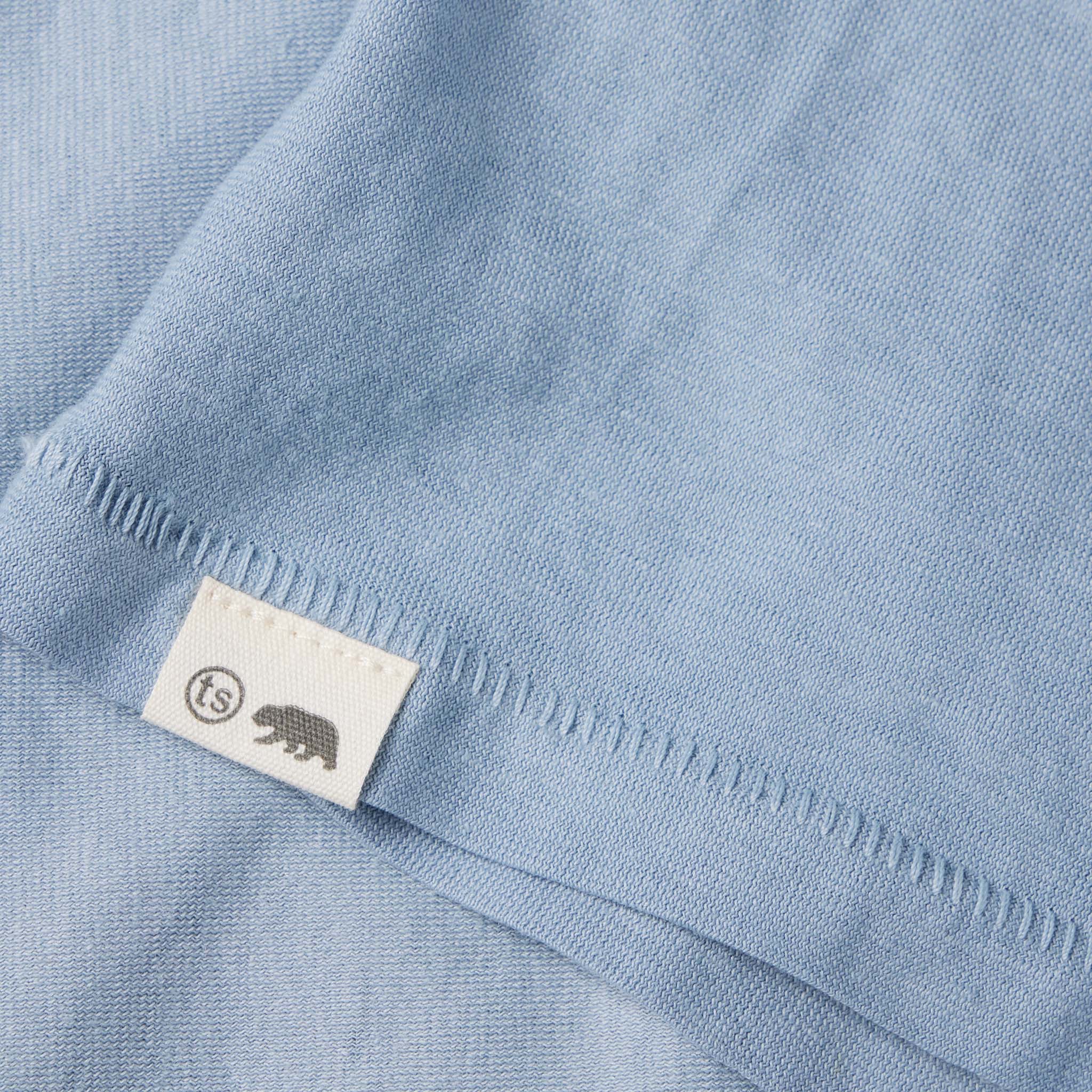 material shot of bottom hem of The Cotton Hemp Tee in Ocean, Knits by Taylor Stitch