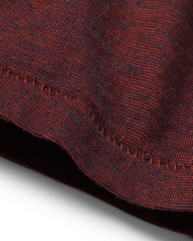 material shot of the hem on The Cotton Hemp Tee in Rust and Navy Stripe, Knits by Taylor Stitch