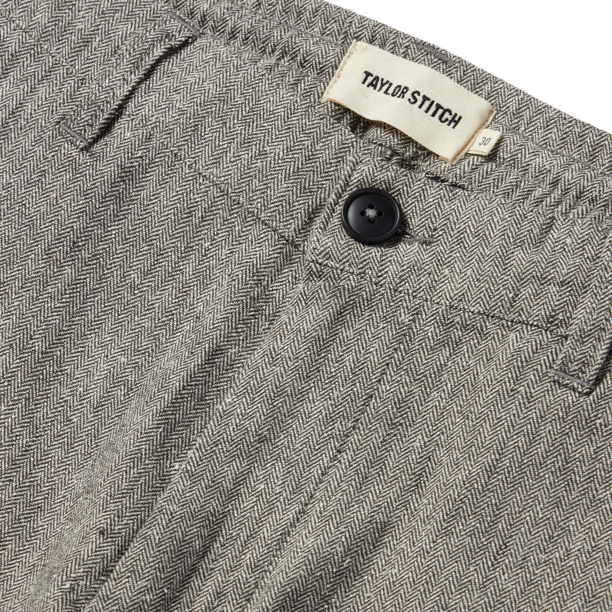 material shot of the button closure on The Easy Pant in Charcoal Herringbone, Bottoms by Taylor Stitch