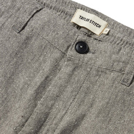 material shot of the button closure on The Easy Pant in Charcoal Herringbone