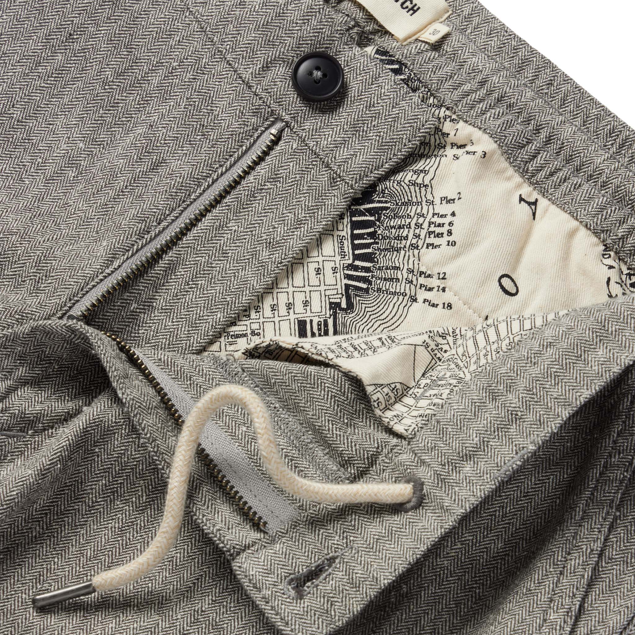 material shot of the internal drawstring and SF map printing on The Easy Pant in Charcoal Herringbone, Bottoms by Taylor Stitch