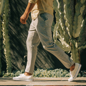 fit model walking in The Easy Pant in Natural Herringbone