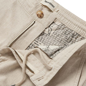 material shot of the SF map printing  and internal drawstring on The Easy Pant in Natural Herringbone