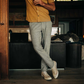 fit model standing in The Easy Pant in Olive Herringbone