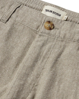 material shot of the button closure on The Easy Pant in Olive Herringbone, Bottoms by Taylor Stitch