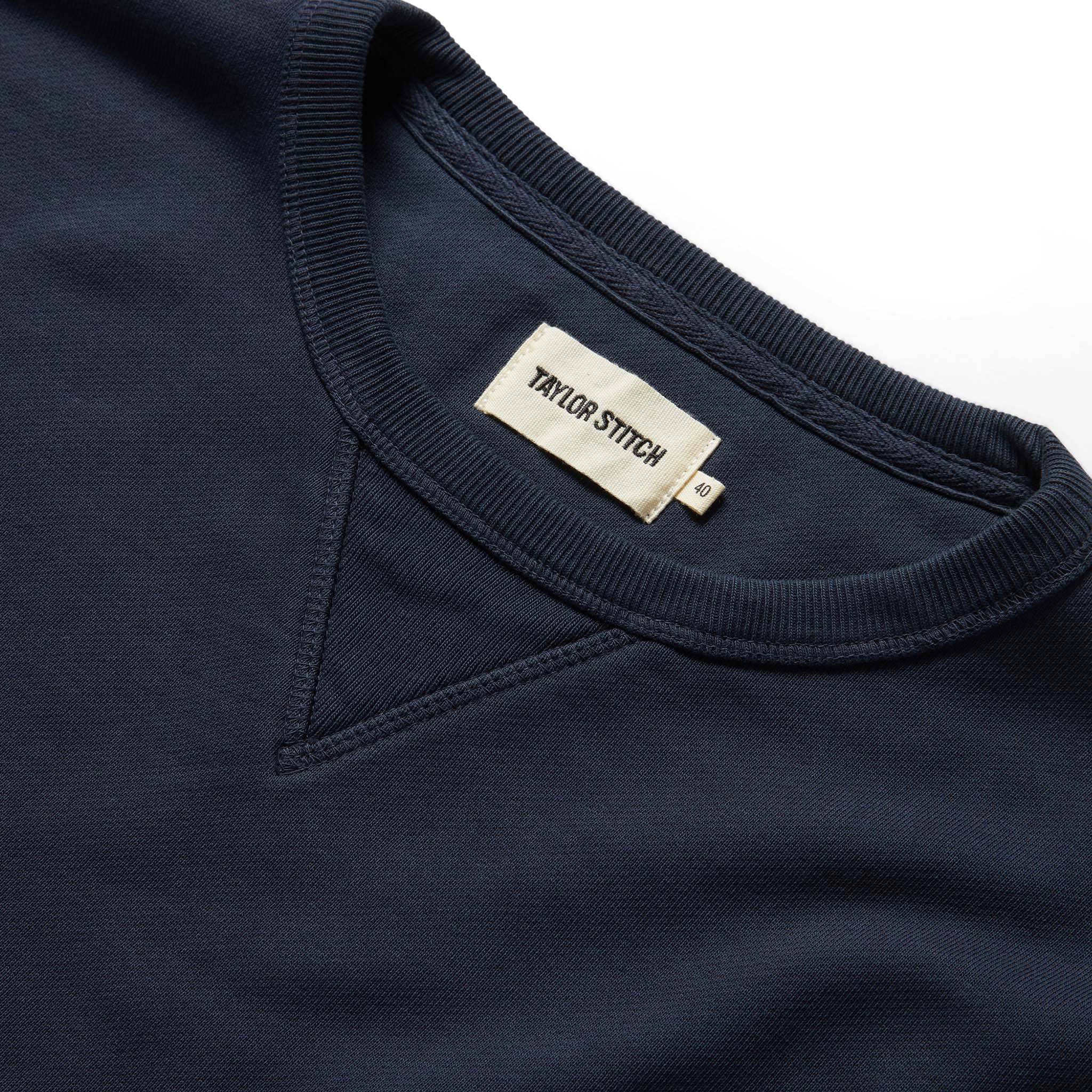 material shot of the ribbed collar and label on The Fillmore Crewneck in Dark Navy, Knits by Taylor Stitch