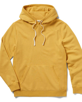 flatlay of The Fillmore Hoodie in Canary, Knits by Taylor Stitch