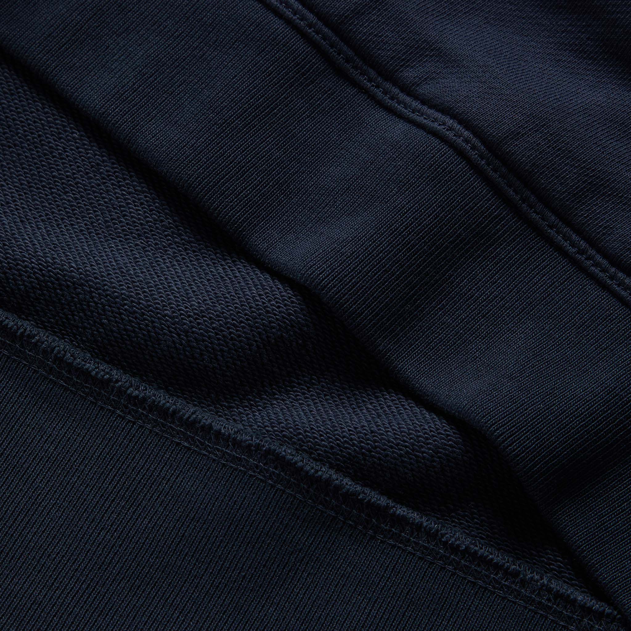 material shot of the ribbed egdes on The Fillmore Hoodie in Dark Navy, Knits by Taylor Stitch