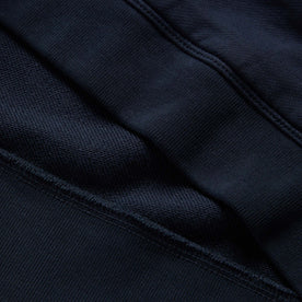 material shot of the ribbed egdes on The Fillmore Hoodie in Dark Navy