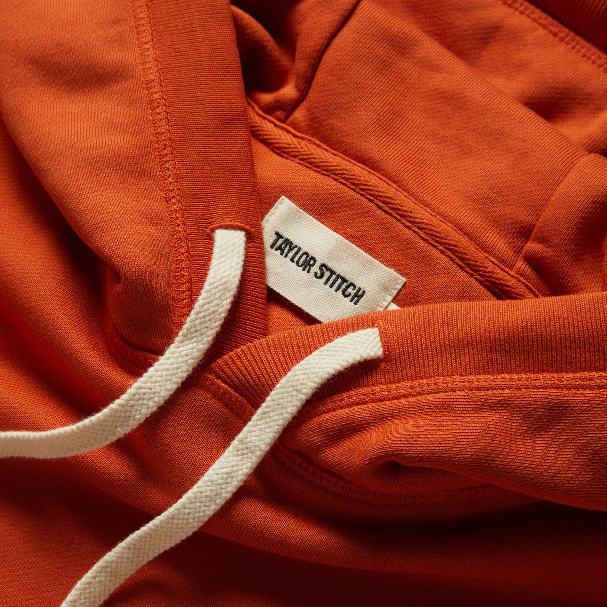 material shot of the drawstring and hood of The Fillmore Hoodie in Rust, Knits by Taylor Stitch