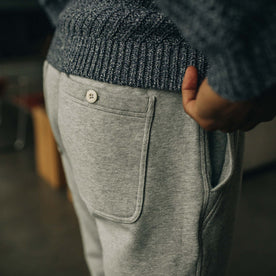 fit model standing in The Fillmore Pant in Heather Grey