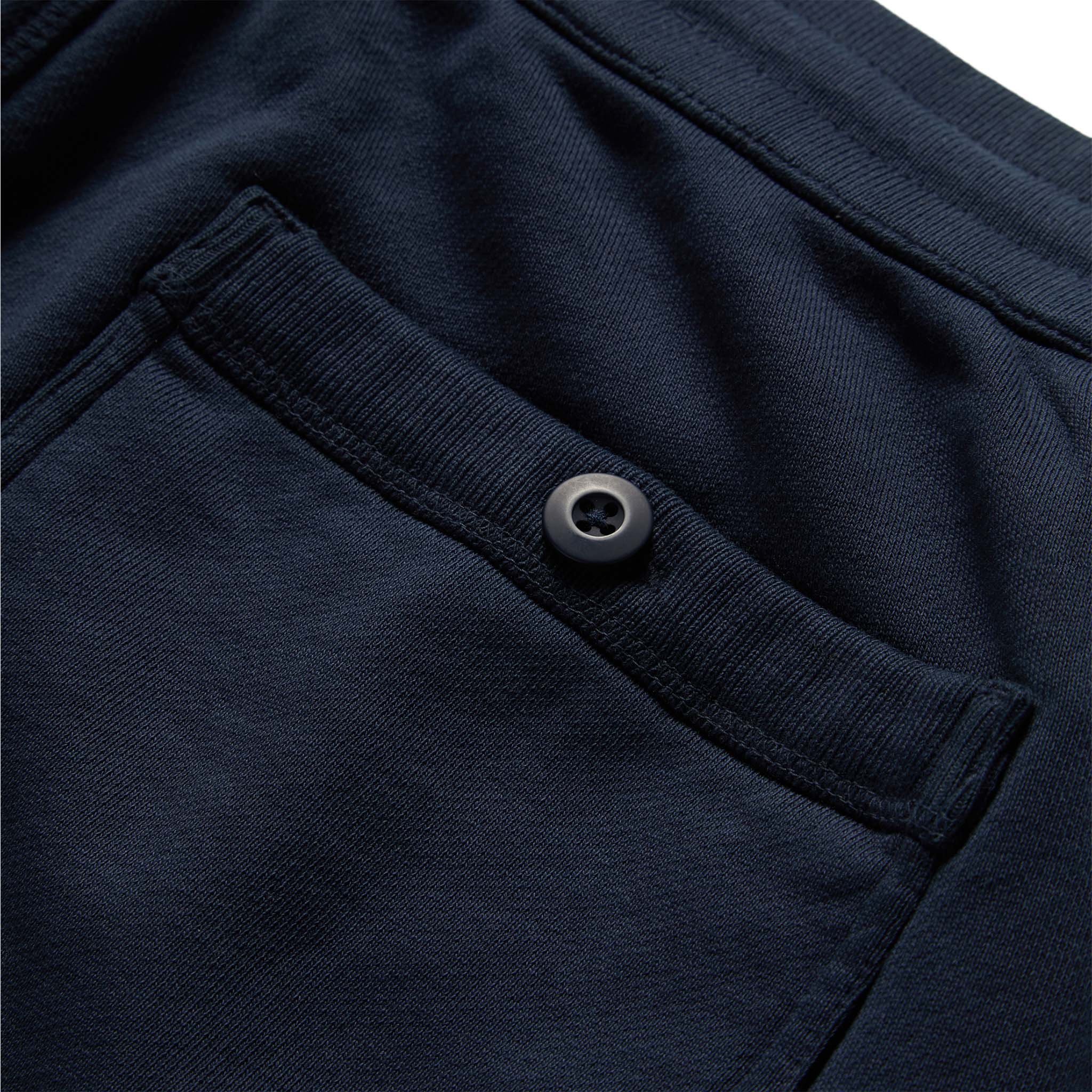 material shot of the rear pocket button on The Fillmore Short in Dark Navy, Shorts by Taylor Stitch
