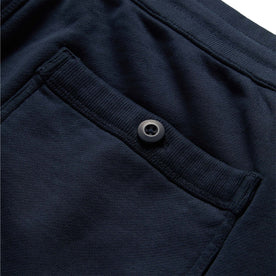 material shot of the rear pocket button on The Fillmore Short in Dark Navy