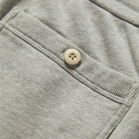 material shot of the rear pocket button on The Fillmore Short in Heather Grey