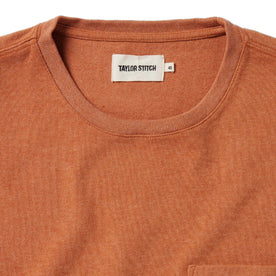 material shot of the front of The Heavy Bag Tee in Apricot