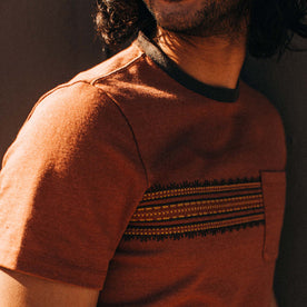 fit model showing the embroidered pattern on The Heavy Bag Tee in Dusty Rose Embroidered Stripe