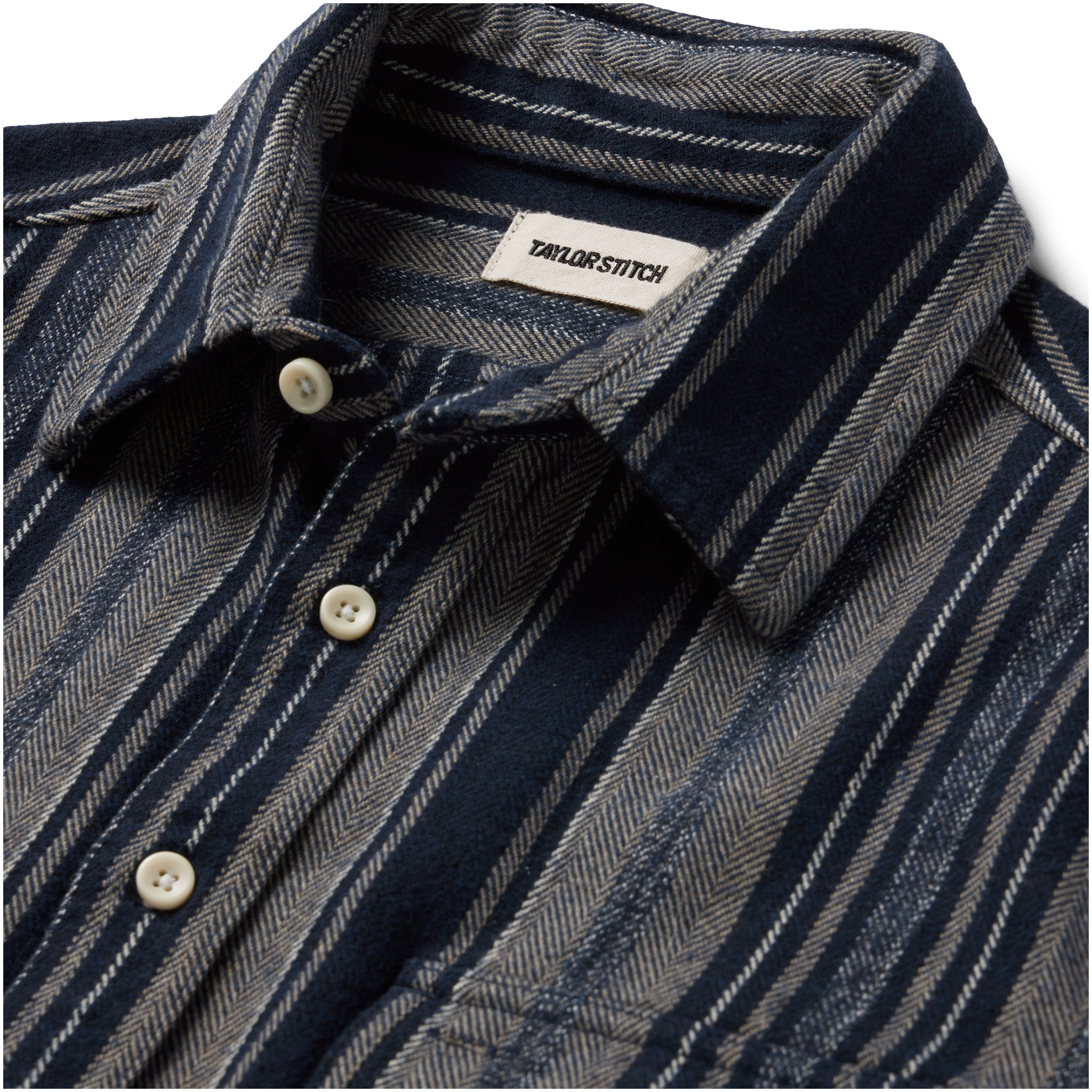 material shot of the collar and buttons on The Ledge Shirt in Ocean Stripe, Wovens by Taylor Stitch