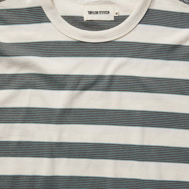 material shot of the collar and label on The Organic Cotton Tee in Natural and Ocean Stripe
