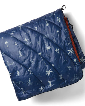 flatlay of The Original Puffy Blanket in Navy Aloha, Accessories by Taylor Stitch