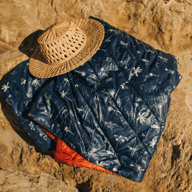 The Original Puffy Blanket in Navy Aloha in the sun