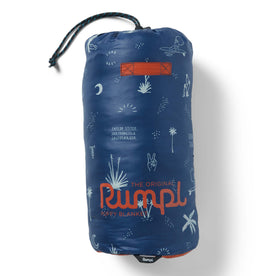 The Original Puffy Blanket in Navy Aloha in its bag