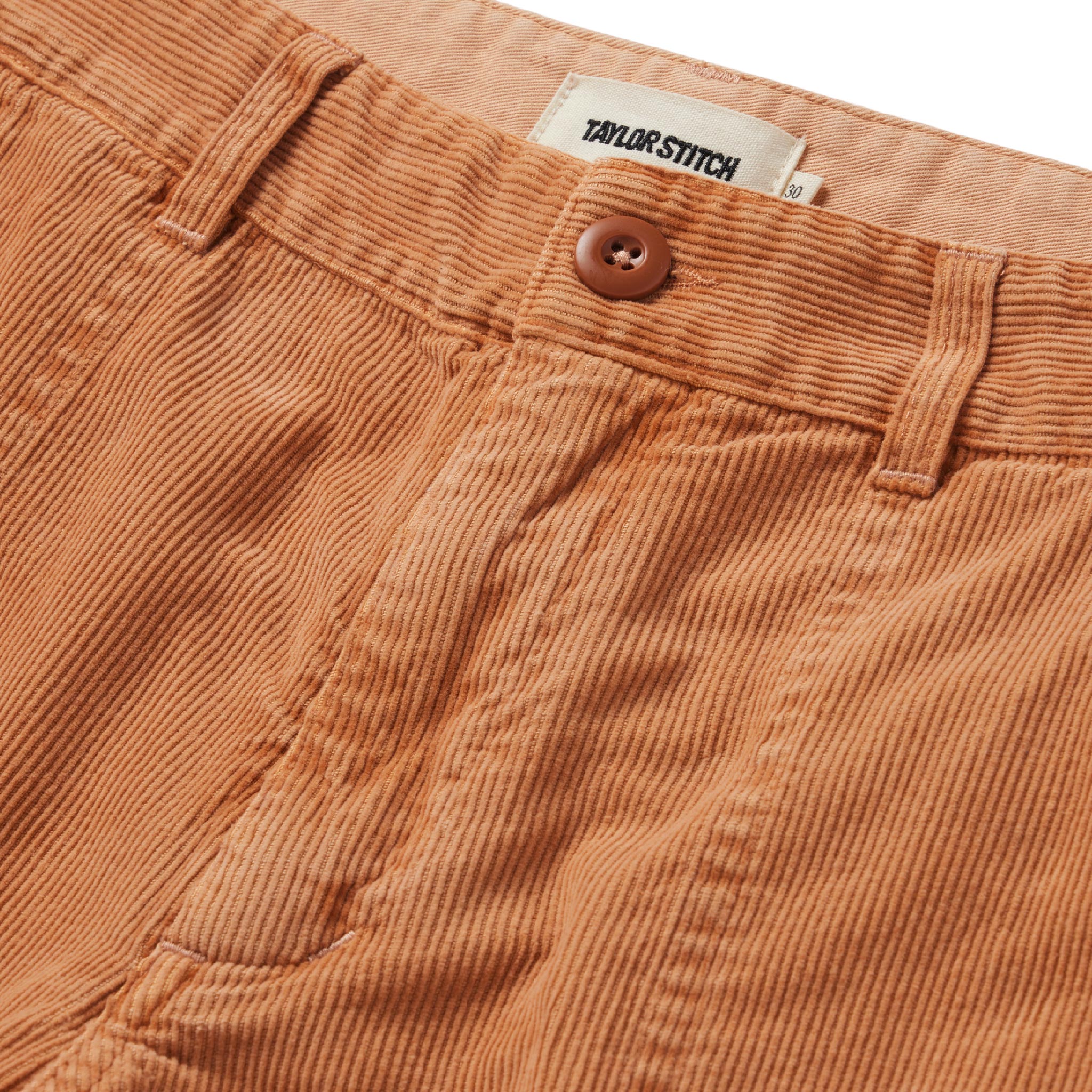 material shot of the button closure on The Trail Short in Apricot Micro Cord, Shorts by Taylor Stitch