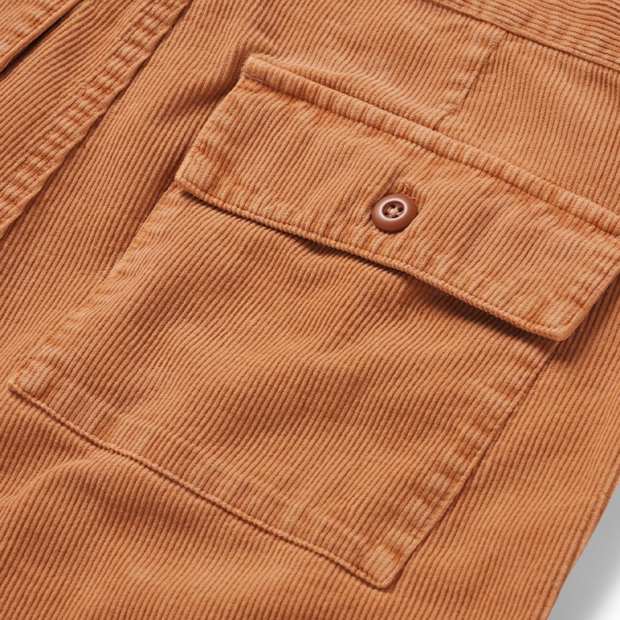 material shot of the rear pocket on The Trail Short in Apricot Micro Cord, Shorts by Taylor Stitch
