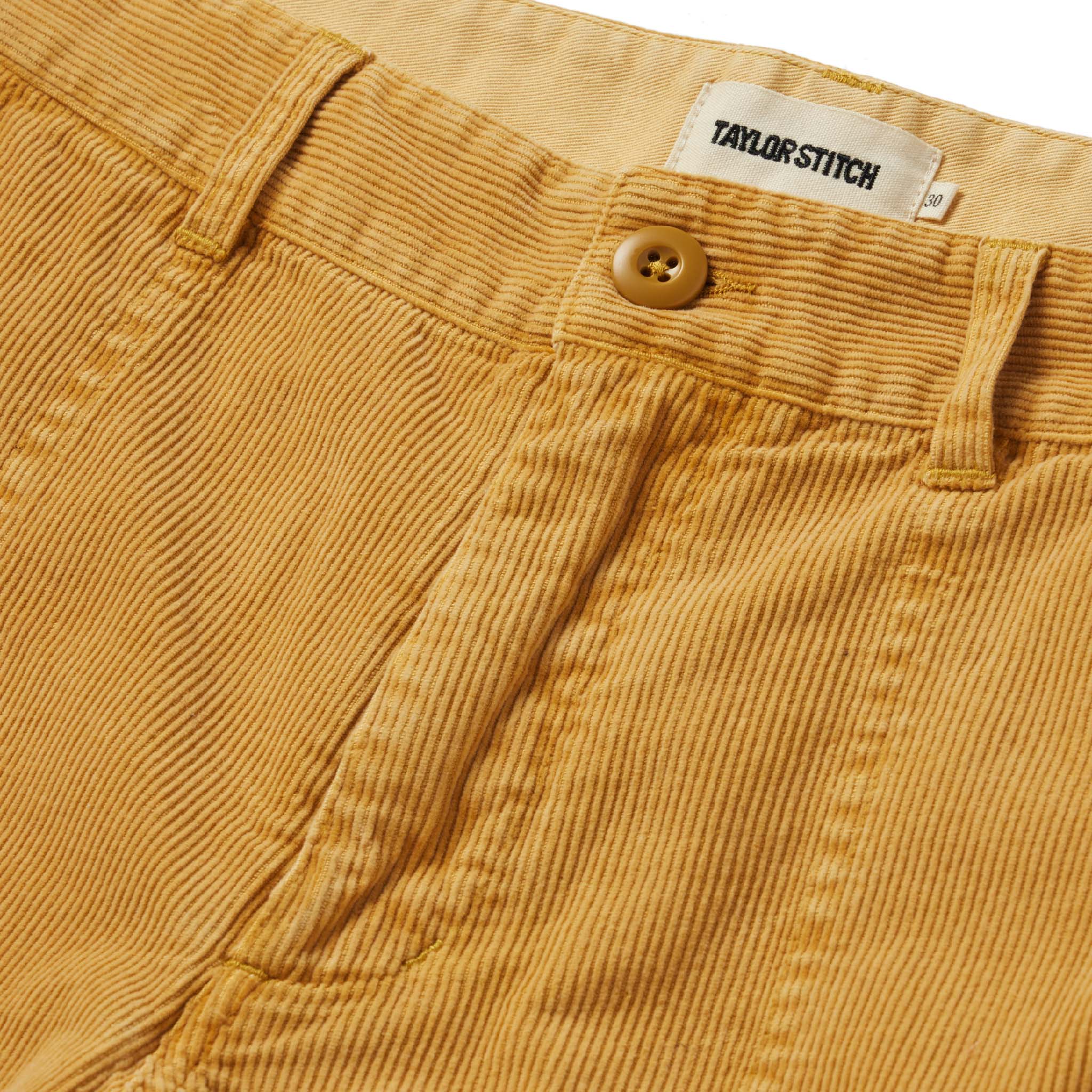 material shot of the button closure on The Trail Short in Gold Micro Cord, Shorts by Taylor Stitch