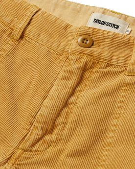 material shot of the button closure on The Trail Short in Gold Micro Cord, Shorts by Taylor Stitch