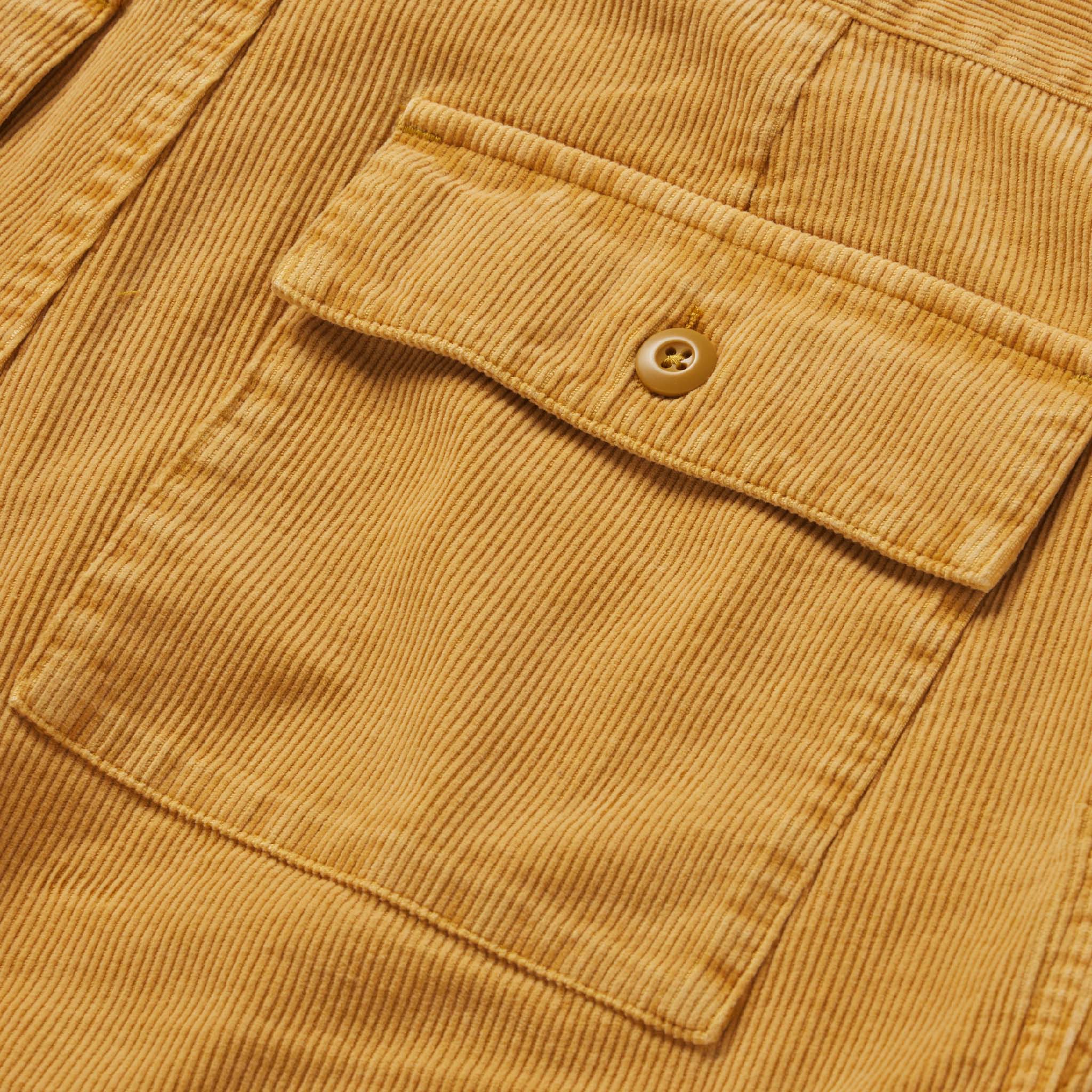 material shot of the rear pocket on The Trail Short in Gold Micro Cord, Shorts by Taylor Stitch