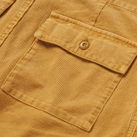 material shot of the rear pocket on The Trail Short in Gold Micro Cord
