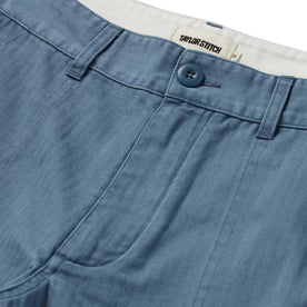 material shot of the button closure on The Trail Short in Ocean Herringbone