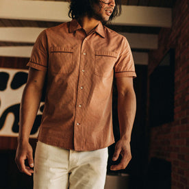 fit model standing in The Tulum in Rust Stripe