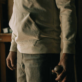 fit mpdel holding a bottle in The Turnover Shirt in Washed Natural